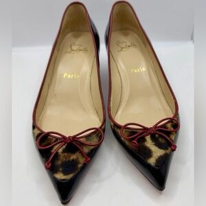 Christian Louboutin Leopard Print Flats with Red Bow